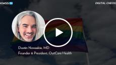 Dr. Dustin Nowaskie, OutCare Health_Rainbow flag waving in the wind by Alexander Spatari/Getty Images