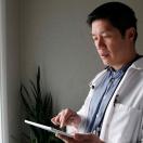 Doctor holding tablet